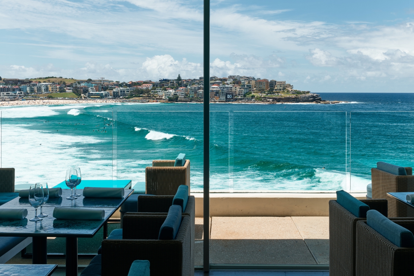 Bondi Beach and the ocean pool seen from the Icebergs balcony